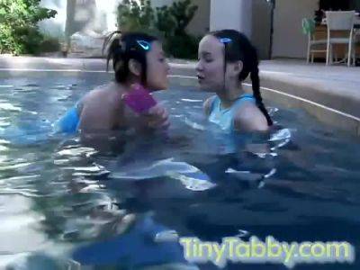 Lesbian hotties toying each other in the pool - hotmovs.com